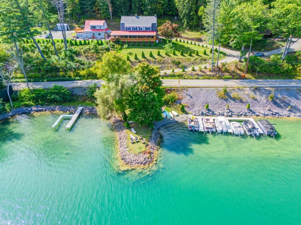 6515_Drone_202_DxO Aerial Drone Real Estate Photograph Taken Above Otsego Lake of Listing in Cooperstown NY Shot by New York Real Estate Photography