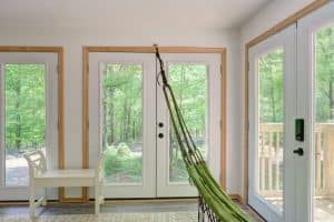 View out windows of a sunporch in an Airbnb